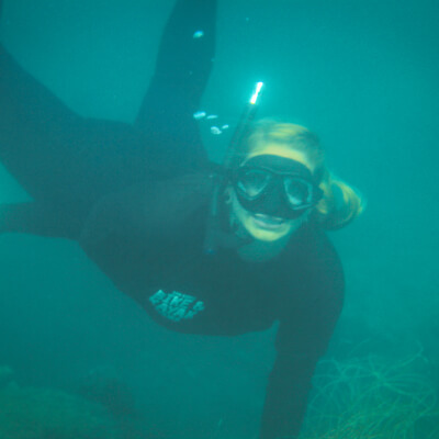 snorkeler underwater on a la jolla snorkel tour