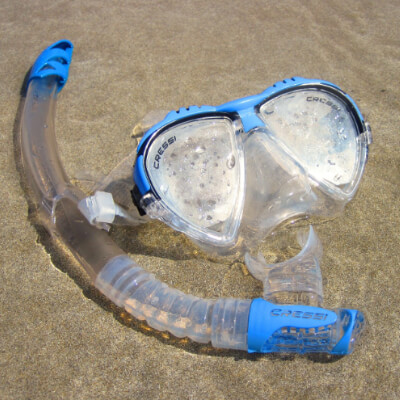 Snorkel and Goggles in the sand